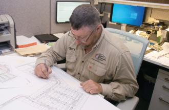 Gary Sowders Working at desk