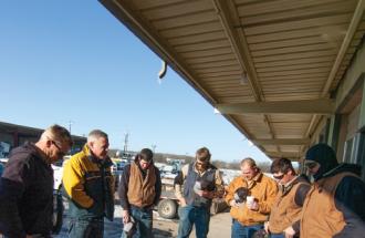 Linemen Praying before restoration